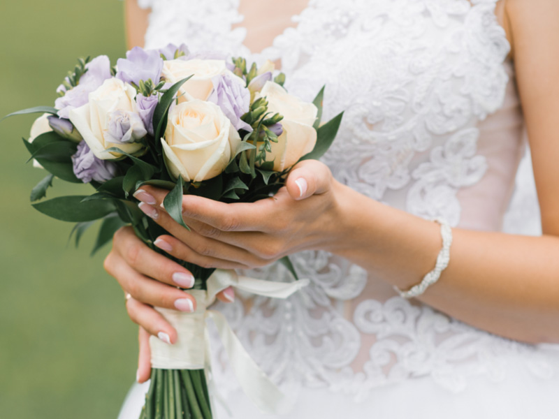 bride with wedding flowers